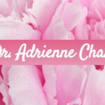 Traditional Chinese Medicine Doctor Adrienne Chan's name in front of a pink flower
